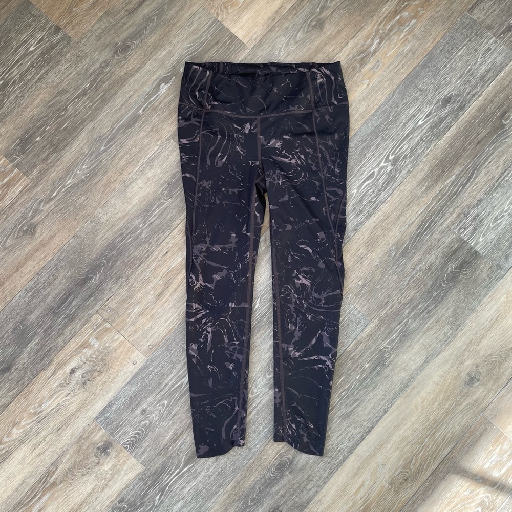 Athleta Marble leggings with laser cut bottom